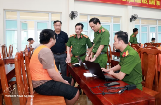 Vietnam, Laos cooperate to bust transnational online fraud ring
